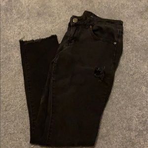 Nice pair of black jeans with a few rips